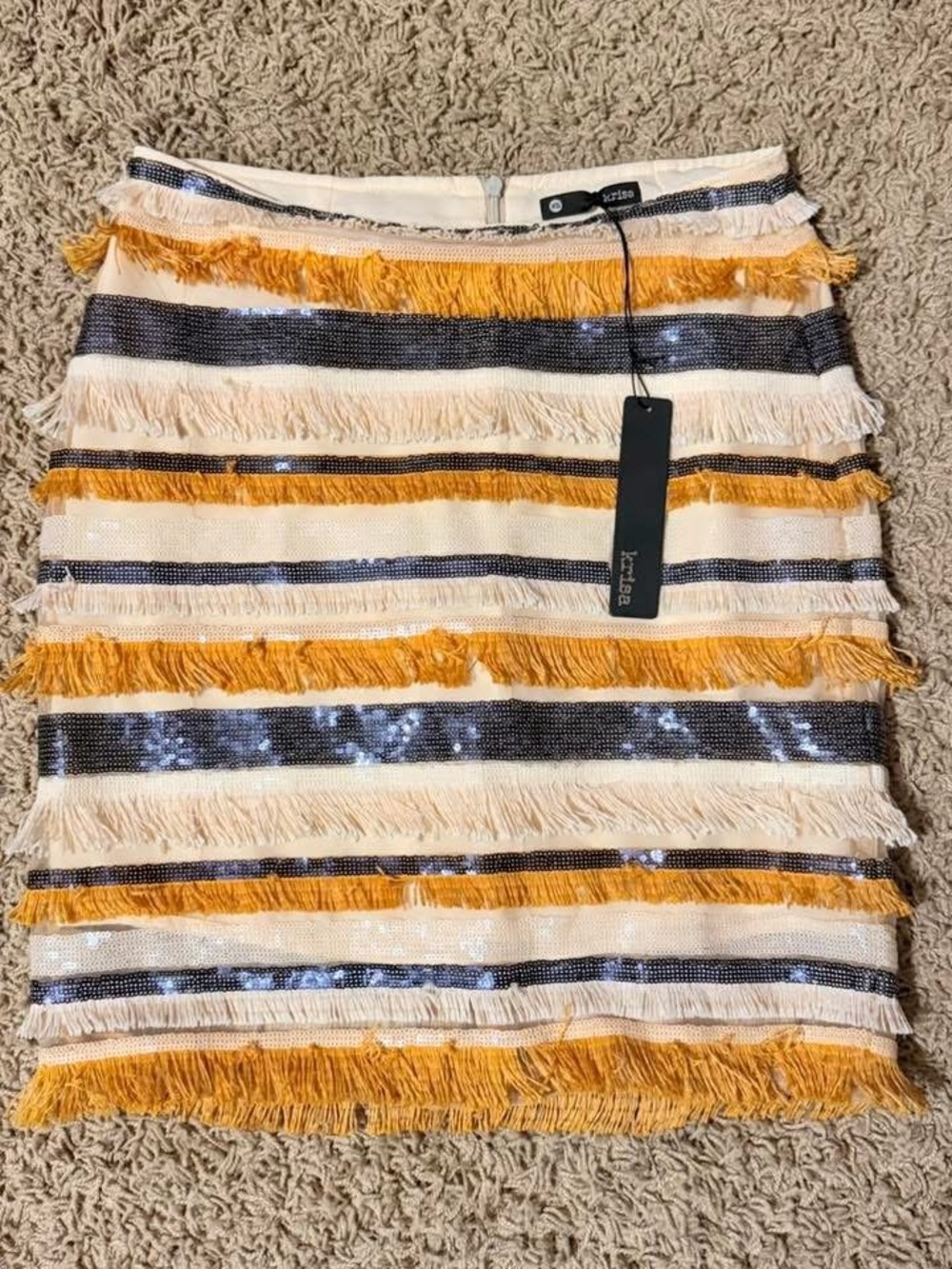 Krisa Havana mini skirt featuring sequin and fringe stripes.